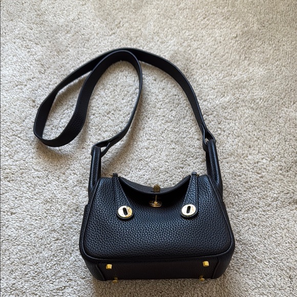 Elegant Black and Gold Mini Bag with Textured Leather - Picture 2 of 3